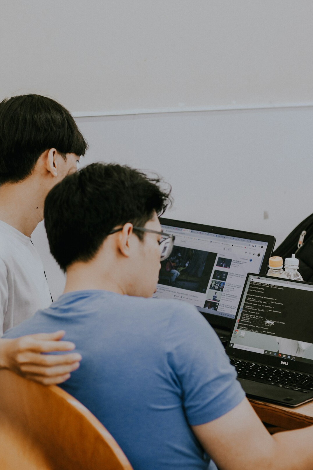 diverse group of students coding together