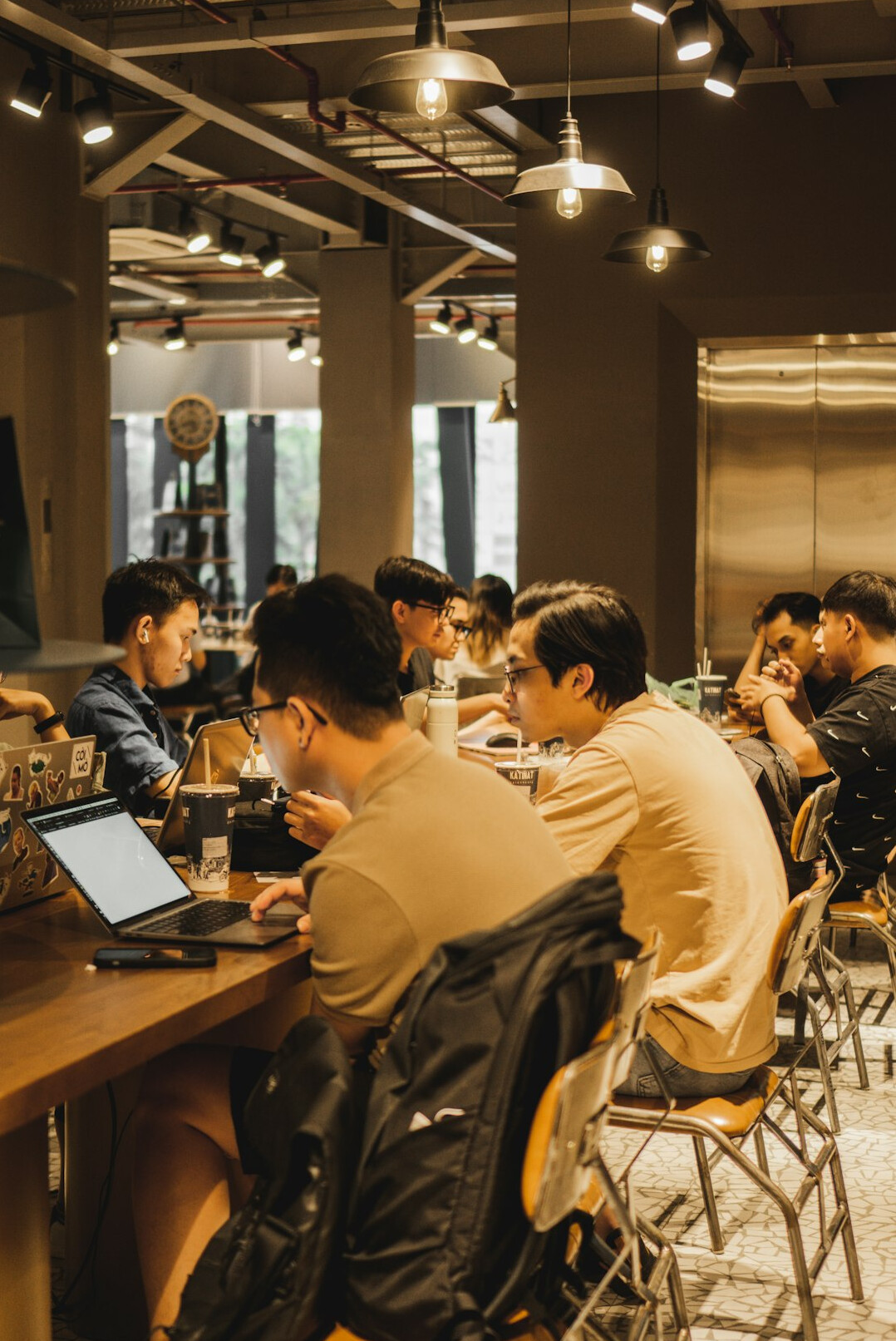 group of japanese programmers collaborating